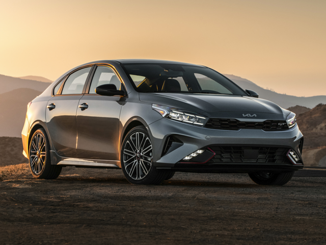 A parked, gray 2023 Kia Forte. | Kia dealer in Bentonville, AR | Crain Kia of Bentonville
