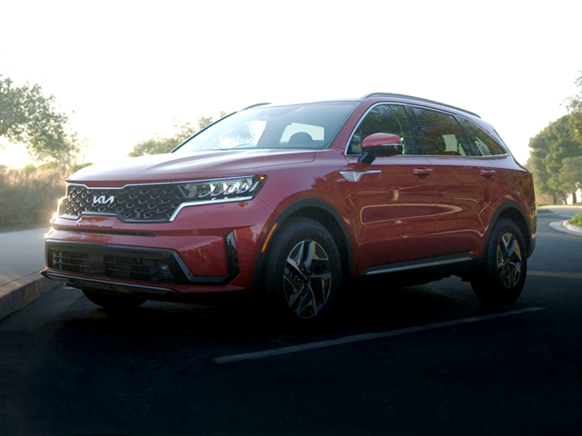 A red 2023 Kia Sorento Hybrid parked in a  parking spot. | Kia dealer in Bentonville, AR | Crain Kia of Bentonville