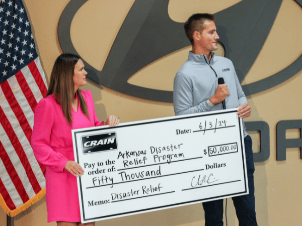 Crain Donation presented to Sarah Huckabee Sanders