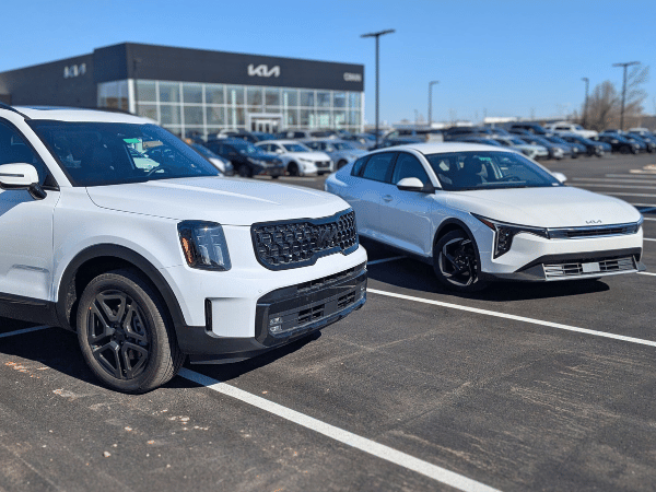 White Kia SUV and Kia Sedan in Bentonville, AR