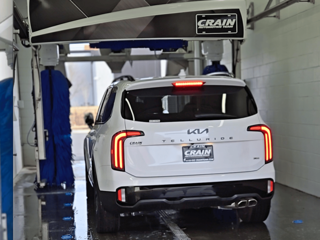 Kia Telluride inside Crain Kia of Bentonville's Car Wash