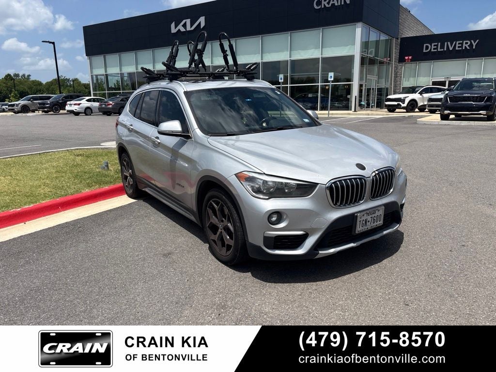 Used 2018 BMW X1 28i with VIN WBXHU7C38J5L05159 for sale in Bentonville, AR